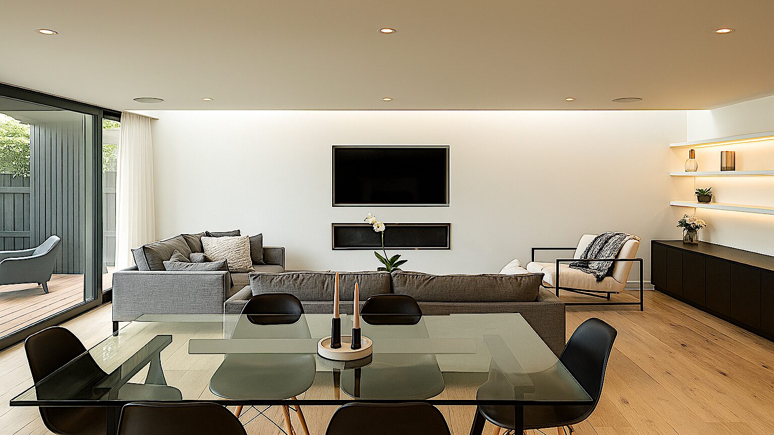 Luxury condo interior with modern grey furniture and glass dining table in Singapore