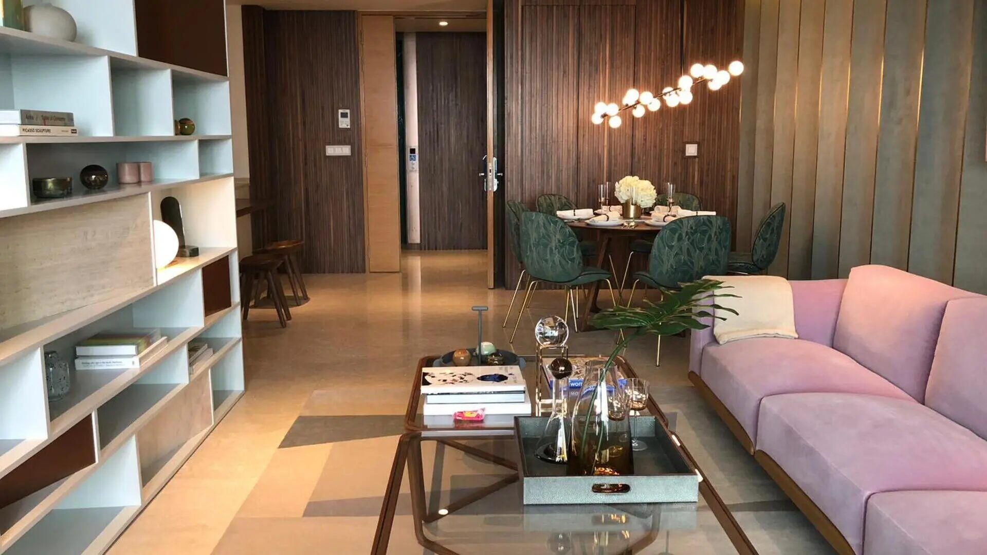 Marina One Residences Penthouse living room with modern interiors and dining space